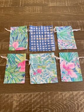 Brand new!  Set of 6 Lilly Pulitzer Drawstring Jewelry Pouches